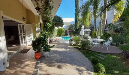 Casa em condomínio fechado com 5 quartos à venda na Rua País de Gales, 41, Marechal Rondon, Canoas, 333 m2 por R$ 2.500.000