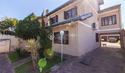 Casa em condomínio fechado com 3 quartos à venda na Rua Boa Esperança, 1145, Rio Branco, Canoas, 243 m2 por R$ 1.064.000