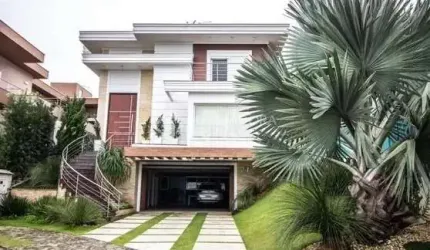 Casa em condomínio fechado com 3 quartos à venda na Avenida Santos Ferreira, 3125, Marechal Rondon, Canoas, 420 m2 por R$ 3.190.000