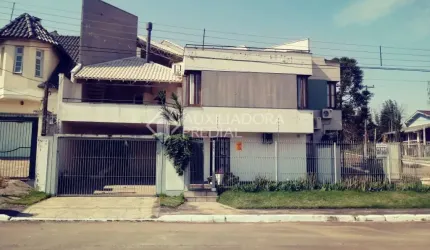 Casa em condomínio fechado com 3 quartos à venda na Rua Marco Aurélio Hidalgo, 17, Nossa Senhora das Graças, Canoas, 173 m2 por R$ 790.000