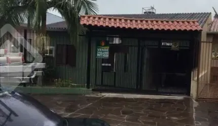 Casa em condomínio fechado com 3 quartos à venda na Rua Brasil, 611, Harmonia, Canoas, 100 m2 por R$ 583.000