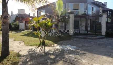 Casa em condomínio fechado com 4 quartos à venda na Rua Gabriel Miro, 230, Marechal Rondon, Canoas, 370 m2 por R$ 2.128.000