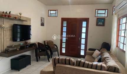 Casa em condomínio fechado com 3 quartos à venda na Rua Lyra, 183, Estância Velha, Canoas, 230 m2 por R$ 999.990