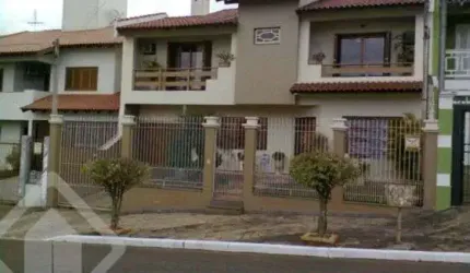 Casa em condomínio fechado com 3 quartos à venda na Rua Turquia, 42, Marechal Rondon, Canoas, 275 m2 por R$ 1.600.000