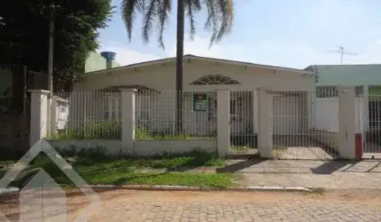 Casa em condomínio fechado com 3 quartos à venda na Rua Marechal Lampert, 340, Harmonia, Canoas, 250 m2 por R$ 700.000