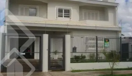 Casa em condomínio fechado com 4 quartos à venda na Rua Áustria, 196, Marechal Rondon, Canoas, 270 m2 por R$ 1.060.000