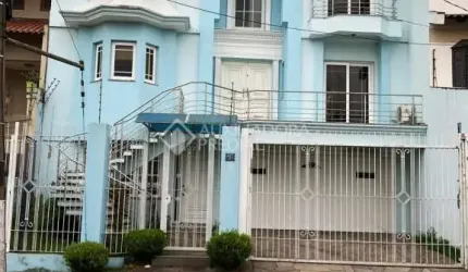 Casa em condomínio fechado com 3 quartos à venda na Rua Vinícius de Moraes, 71, Marechal Rondon, Canoas, 390 m2 por R$ 2.500.000