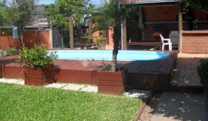 Casa com 3 quartos à venda na Rua Capiberibe, 318, Igara, Canoas, 256 m2 por R$ 1.275.000