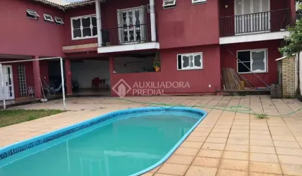 Casa em condomínio fechado com 5 quartos à venda na Rua Fermino Correa da Gama, 381, Vila Monte Carlo, Cachoeirinha, 440 m2 por R$ 1.400.000