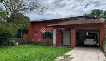 Casa com 3 quartos à venda na Rua Caxias, 1030, Centro, Esteio, 528 m2 por R$ 669.999