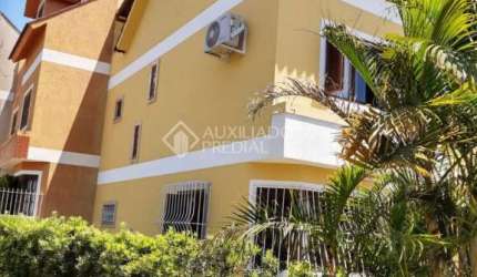 Casa com 3 quartos à venda na Rua Helio Felix Frey, 195, Espírito Santo, Porto Alegre, 150 m2 por R$ 490.000