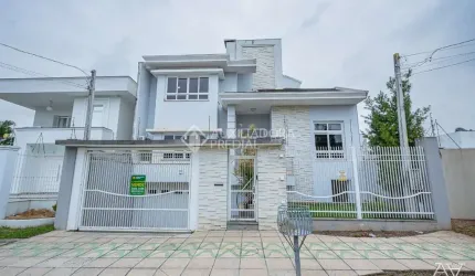 Casa com 5 quartos à venda na Rua País de Gales, 137, Marechal Rondon, Canoas, 359 m2 por R$ 1.599.999