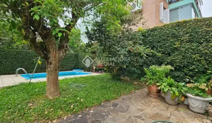Casa em condomínio fechado com 3 quartos à venda na Rua Disnard, 41, Santa Tereza, Porto Alegre, 385 m2 por R$ 1.250.000