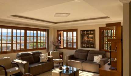 Casa com 4 quartos à venda na Rua Dolores Duran, 2306, Lomba do Pinheiro, Porto Alegre, 234 m2 por R$ 640.000