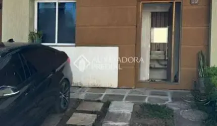 Casa em condomínio fechado com 3 quartos à venda na Rua Alberto Jerônimo Guerra, 20, Mário Quintana, Porto Alegre, 147 m2 por R$ 490.000