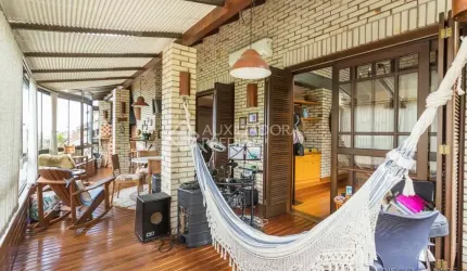 Casa em condomínio fechado com 4 quartos à venda na Rua Erechim, 100, Nonoai, Porto Alegre, 331 m2 por R$ 1.050.000