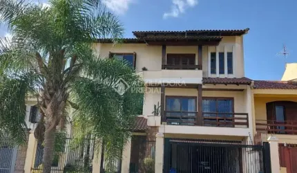 Casa em condomínio fechado com 4 quartos à venda na Rua Maestro Salvador Campanella, 116, Jardim Itu Sabará, Porto Alegre, 410 m2 por R$ 1.400.000