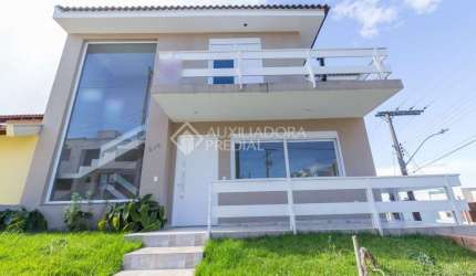 Casa em condomínio fechado com 3 quartos à venda na Rua Ângelo Raphael Frizzo, 240, Mário Quintana, Porto Alegre, 212 m2 por R$ 1.000.000