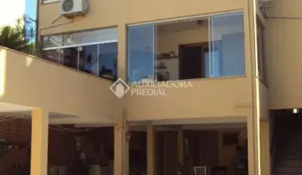 Casa com 3 quartos à venda na Avenida Benno Mentz, 1088, Vila Ipiranga, Porto Alegre, 290 m2 por R$ 1.200.000