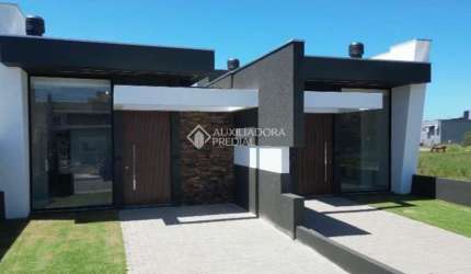 Casa com 3 quartos à venda na Flávio Scheffer, 46, Guarani, Capão da Canoa, 88 m2 por R$ 529.000