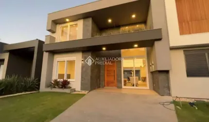 Casa em condomínio fechado com 4 quartos à venda na Rua Rio Divisa, 22, Centro, Xangri-Lá, 228 m2 por R$ 2.279.900