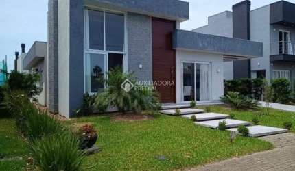 Casa em condomínio fechado com 3 quartos à venda na Honório Germano, 2005, Condomínio Dubai Resort, Capão da Canoa, 135 m2 por R$ 1.470.000