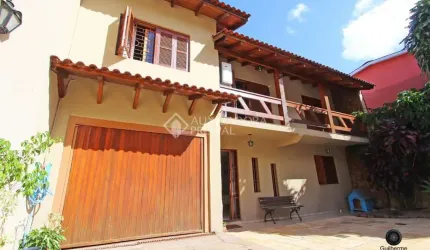 Casa em condomínio fechado com 4 quartos à venda na Rua Francisca Lechner, 343, Parque Santa Fé, Porto Alegre, 263 m2 por R$ 650.000