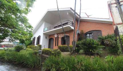 Casa com 6 quartos à venda na Praça Lima Duarte, 57, Chácara das Pedras, Porto Alegre, 406 m2 por R$ 2.450.000