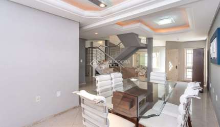 Casa com 4 quartos à venda na Rua Maria Elaine Wotter, 75, Rubem Berta, Porto Alegre, 315 m2 por R$ 639.000