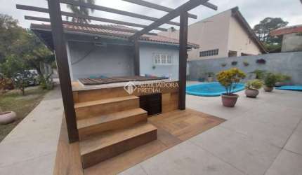 Casa em condomínio fechado com 2 quartos à venda na Avenida Independência, 395, Flórida, Guaíba, 205 m2 por R$ 760.000