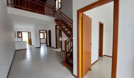 Casa com 3 quartos à venda na Rua Amoni, 41, Hípica, Porto Alegre, 130 m2 por R$ 369.000