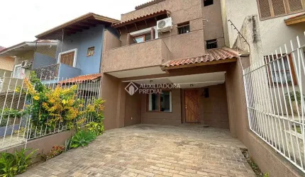 Casa com 3 quartos à venda na Rua Helio Felix Frey, 162, Espírito Santo, Porto Alegre, 125 m2 por R$ 500.000