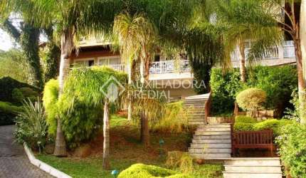 Casa em condomínio fechado com 3 quartos à venda na Rua Professor Xavier Simões, 495, Tristeza, Porto Alegre, 208 m2 por R$ 1.450.000