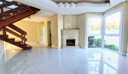 Casa em condomínio fechado com 3 quartos à venda na Rua Doutor Arnaldo da Silva Ferreira, 465, Jardim Isabel, Porto Alegre, 209 m2 por R$ 1.240.000