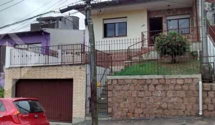 Casa com 3 quartos à venda na Rua Doutor Lucidoro Brito, 135, Santa Tereza, Porto Alegre, 200 m2 por R$ 551.000