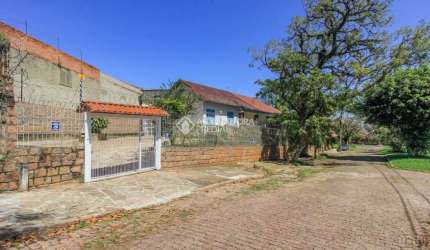 Casa com 3 quartos à venda na Avenida Felipe Weimann, 58, Santa Tereza, Porto Alegre, 120 m2 por R$ 450.000