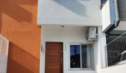 Casa com 3 quartos à venda na Rua Angico, 125, Hípica, Porto Alegre, 131 m2 por R$ 645.000