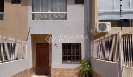 Casa em condomínio fechado com 2 quartos à venda na Rua Irmão Jaime Biazus, 221, Guarujá, Porto Alegre, 86 m2 por R$ 460.000