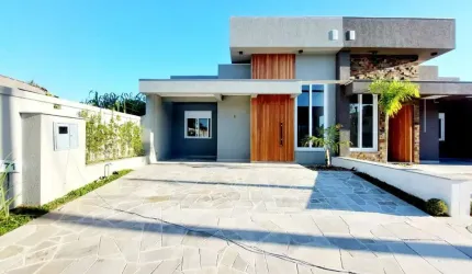 Casa em condomínio fechado com 3 quartos à venda na Avenida Juca Batista, 5505, Hípica, Porto Alegre, 164 m2 por R$ 699.000