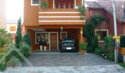 Casa com 3 quartos à venda na Rua Fernando Jorge Schneider, 113, Hípica, Porto Alegre, 150 m2 por R$ 625.000