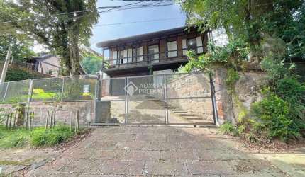 Casa em condomínio fechado com 3 quartos à venda na Rua Charruas, 59, Espírito Santo, Porto Alegre, 176 m2 por R$ 750.000