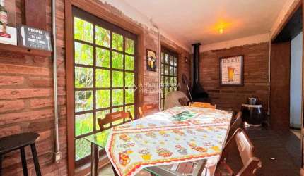 Casa com 4 quartos à venda na Rua Jóia, 220, Vila Nova, Porto Alegre, 200 m2 por R$ 520.000