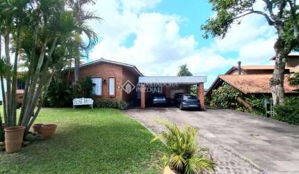 Casa em condomínio fechado com 5 quartos à venda na Avenida Firmino Octávio Bimbi, 255, Cavalhada, Porto Alegre, 274 m2 por R$ 1.390.000