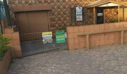 Casa com 3 quartos à venda na Avenida Edgar Pires de Castro, 3190, Restinga, Porto Alegre, 160 m2 por R$ 750.000