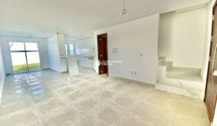 Casa em condomínio fechado com 3 quartos à venda na Rua Francisco Mattos Terres, 575, Aberta dos Morros, Porto Alegre, 103 m2 por R$ 559.900