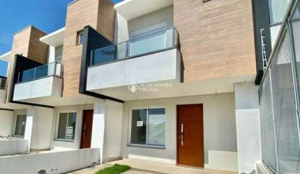 Casa em condomínio fechado com 3 quartos à venda na Rua Francisco Mattos Terres, 569, Aberta dos Morros, Porto Alegre, 108 m2 por R$ 562.900