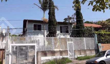 Casa em condomínio fechado com 3 quartos à venda na Rua dos Caiaguais, 207, Espírito Santo, Porto Alegre, 220 m2 por R$ 550.000