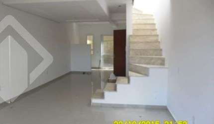 Casa em condomínio fechado com 3 quartos à venda na Avenida Vereador Roberto Landell de Moura, 328, Campo Novo, Porto Alegre, 101 m2 por R$ 345.000