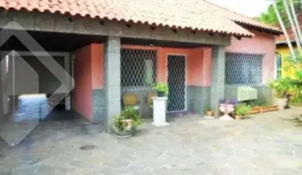 Casa em condomínio fechado com 5 quartos à venda na Rua Criciúma, 73, Guarujá, Porto Alegre, 220 m2 por R$ 453.000