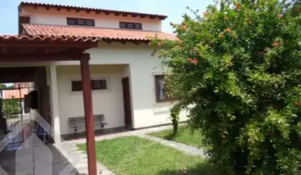 Casa em condomínio fechado com 4 quartos à venda na Travessa Alfredo Magalhães, 81, Cavalhada, Porto Alegre, 240 m2 por R$ 930.000